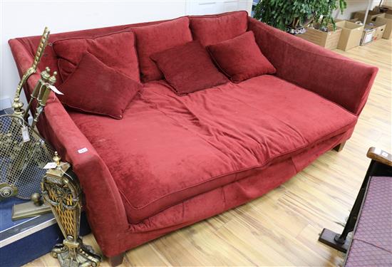 An upholstered day bed W.210cm